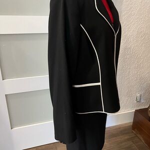 Black Tahari women’s suit as 12